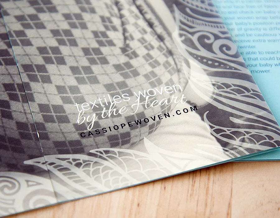 The bottom right corner of the brochure for Cassiope Woven. "Textiles woven by the heart." 