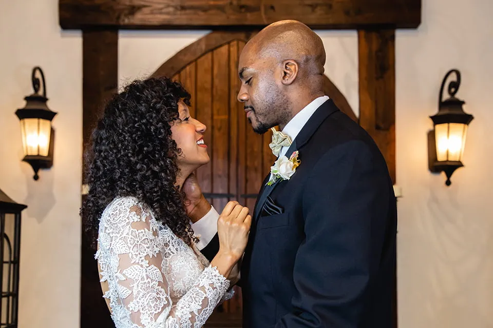 Looking Back on a Year of Web Design OKC - myheartcreative A bride and groom look into each other's eyes on their wedding day.