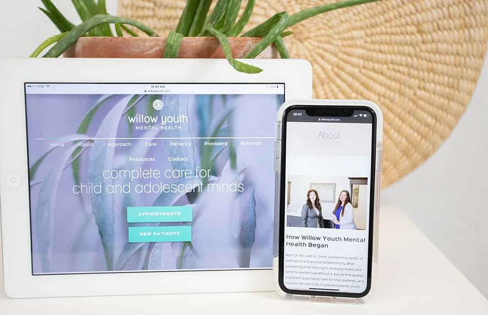 Improve Content Engagement through Design - myheartcreative A visually-interesting website design OKC for Willow Youth Mental Health. Their homepage is shown on a white iPad, while the About page is shown on an iPhone.