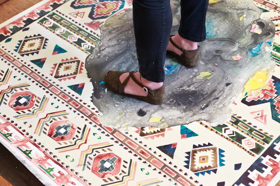 Make work. - myheartcreative An artist from In The Make wears brown flats and standard on a colorful patterned rug.