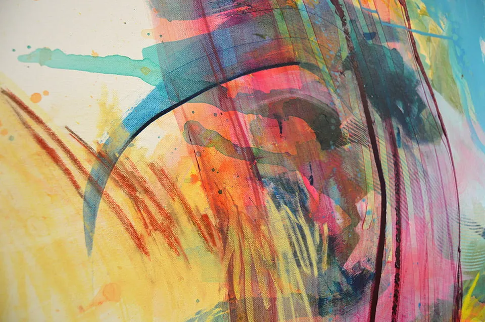An up-close shot of a colorful abstract painting by Virginia Sitzes. 