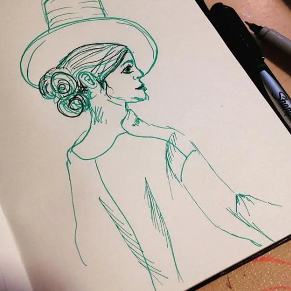 A sketch of a woman wearing a top hat in black and green pen. 
