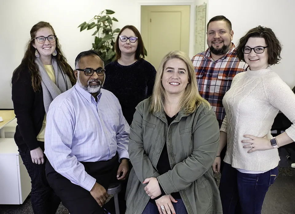 The myheartcreative studio team photo with six members. 