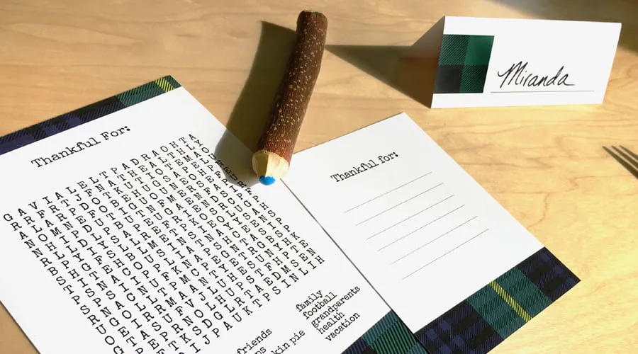 A Thanksgiving printable word search, plate card, and name card with buffalo plaid accents. 