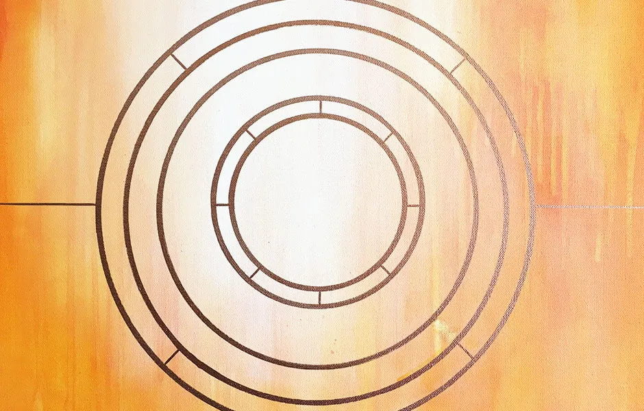 An orange abstract painting by Sara Day-Short. The painting has a gold circular design in gold. 