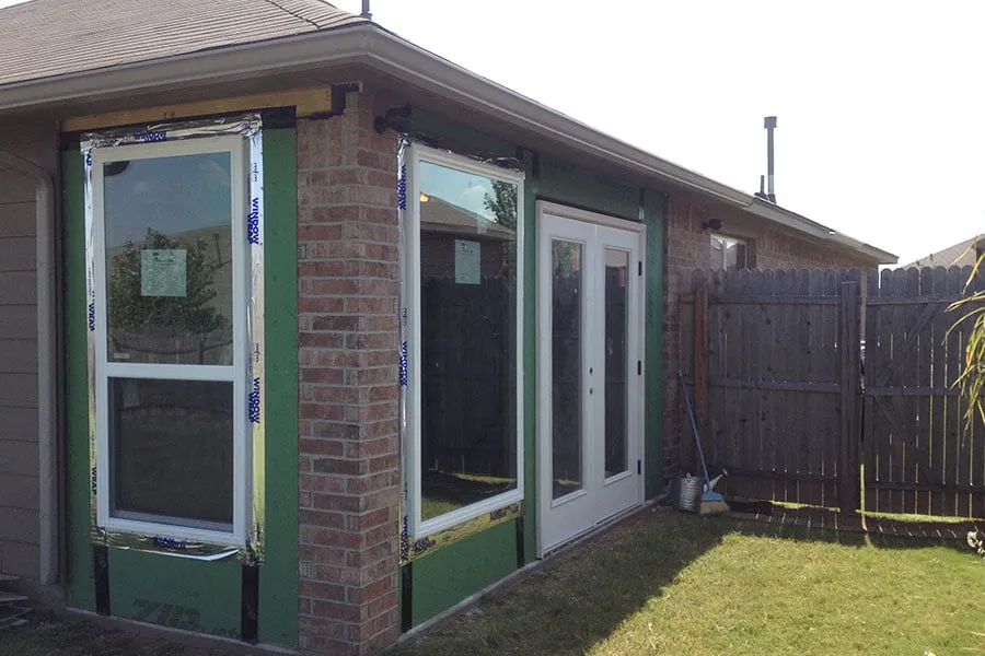 The myheartcreative home studio with windows and a double backdoor. 