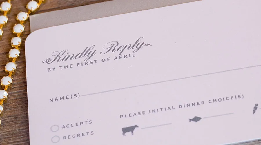 Styled Stationery - myheartcreative A close-up of the Reply cards for the styled shoot. The card says, "Kindly reply by the first of April" and gives a place for guests to write their name(s), whether they accept or regret the invite, and "please initial dinner choice(s)."