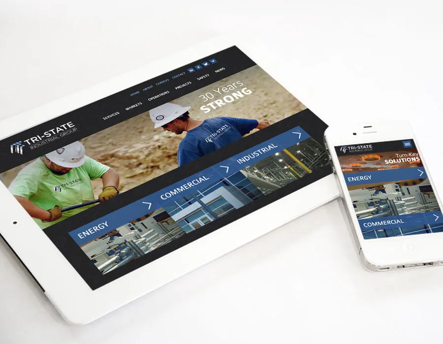 4 Website Design Launches for 4 Prominent Companies - myheartcreative The Tri-State Industrial Group web design on a white tablet and smartphone.