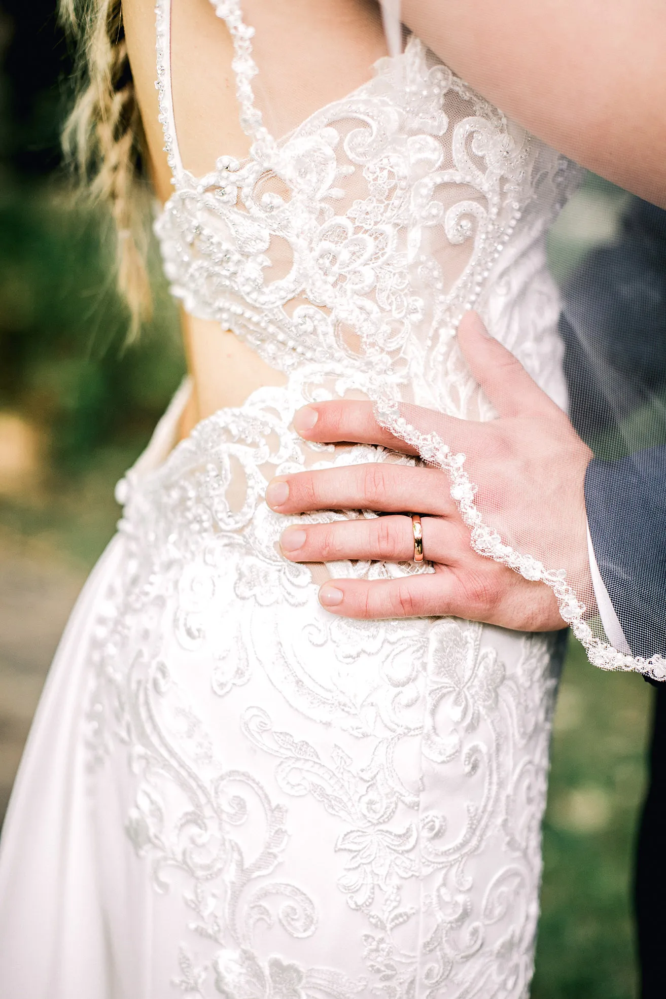 Derek and Shelby Thunderbird Chapel Wedding - myheartcreative Derek's hand rests on Shelby's hip. The photo showcases Derek's wedding band.