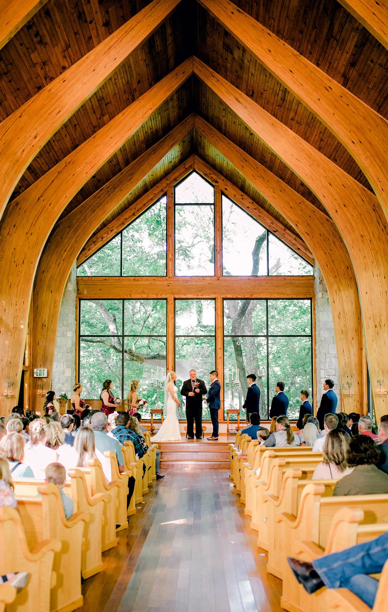 Derek and Shelby Thunderbird Chapel Wedding - myheartcreative A wide shot of the inside of Derek and Shelby's wedding ceremony inside of the Thunderbird Chapel.
