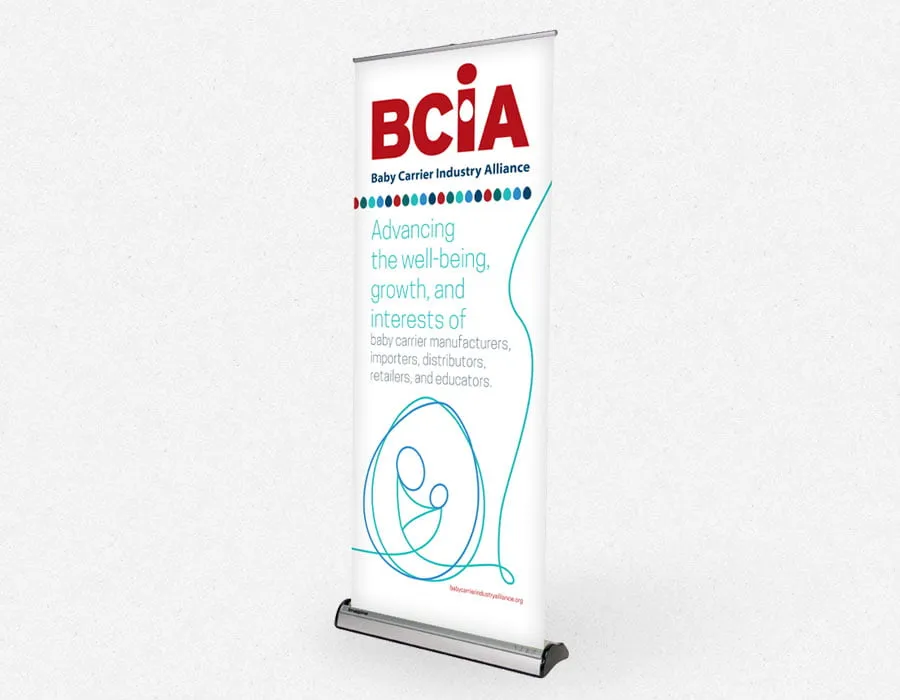 BCIA Designs - myheartcreative The retractable banner design with the BCIA. The main text on the banner says, "Advancing the well-being, growth, and interests of baby carrier manufacturers, importers, distributors, retailers, and educators."