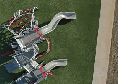 A gray playground set from a vertical point of view.