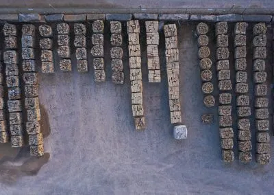Rows of stacked natural stone from a vertical point of view.