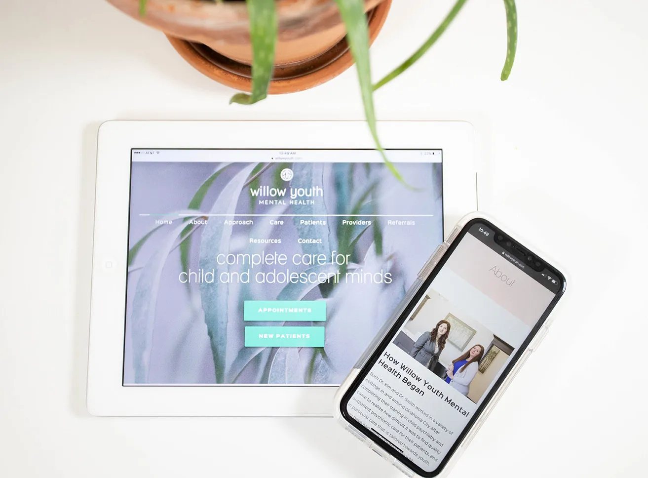 Mistakes to Avoid While Designing Custom Websites - myheartcreative The responsive OKC web design for Willow Youth shown on a tablet and smartphone.