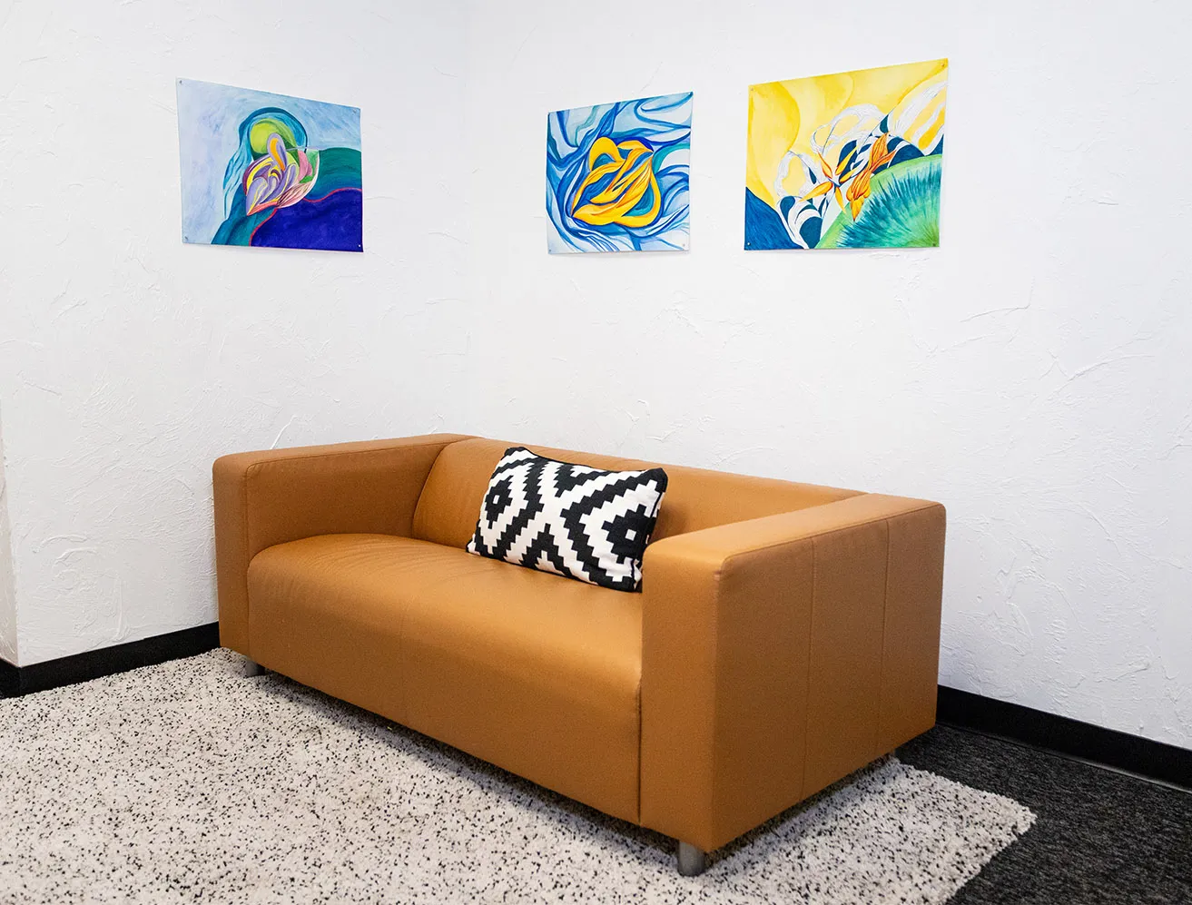 The Science of Art - myheartcreative Three abstract pieces by Malcolm Zachariah hang on the walls in the myheartcreative studio.