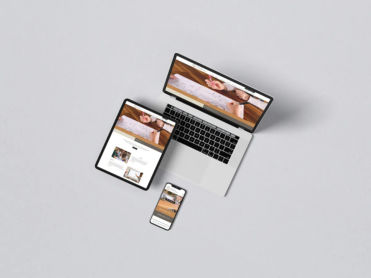 The new website design for Office Interiors on a laptop, tablet, and smartphone. 