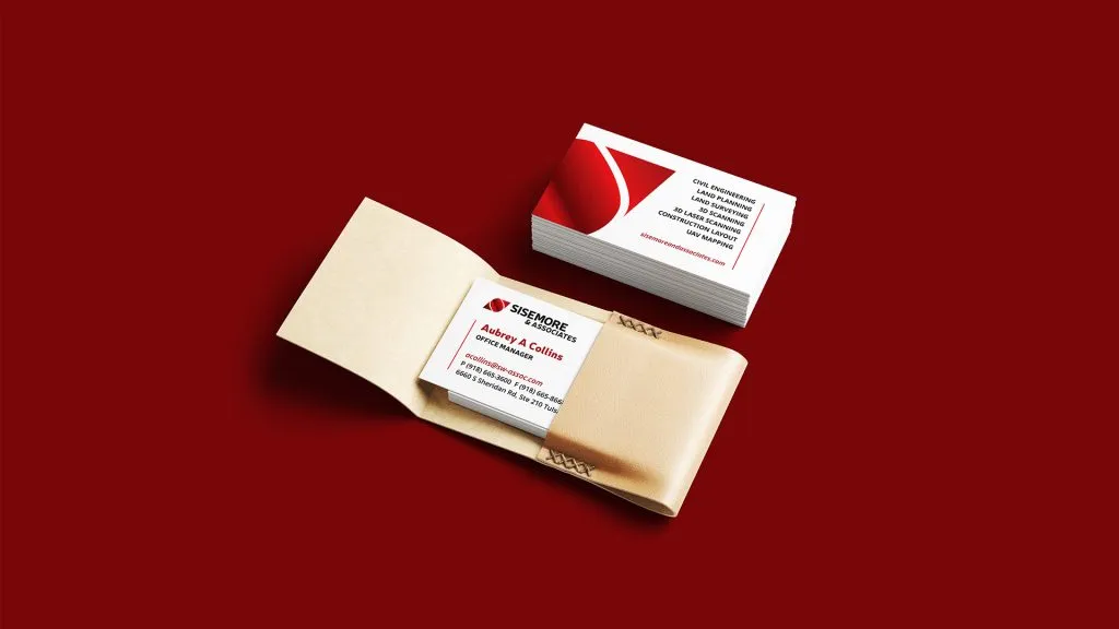 The front and back of the business cards for Sisemore & Associates with gradient accents. 