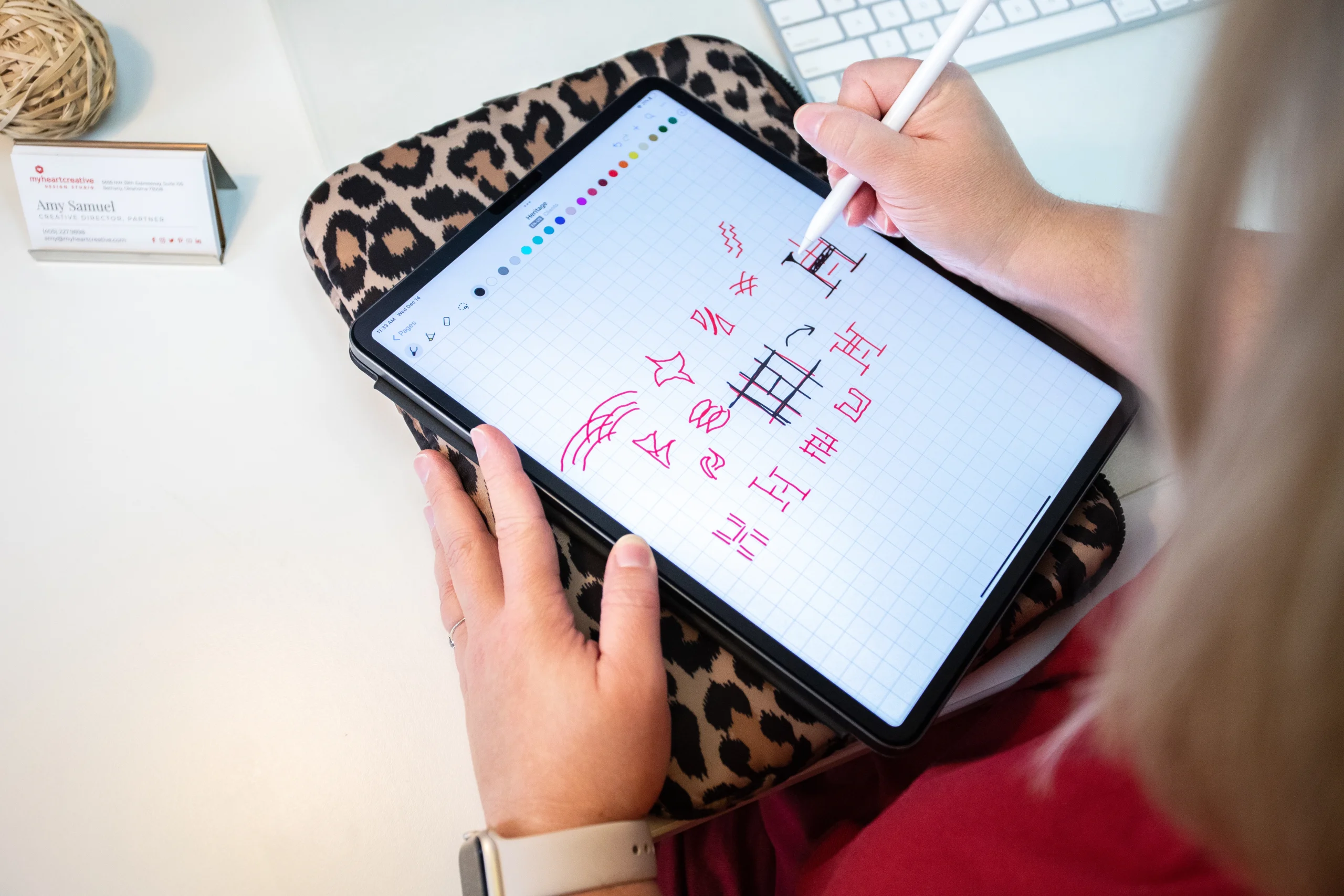 Understanding the Logo Design OKC Process - myheartcreative The Creative Director sketching a logo design on her iPad.