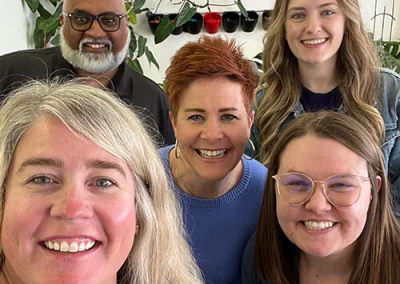 The myheartcreative team smiles for a picture with Project31 founder Sarah.