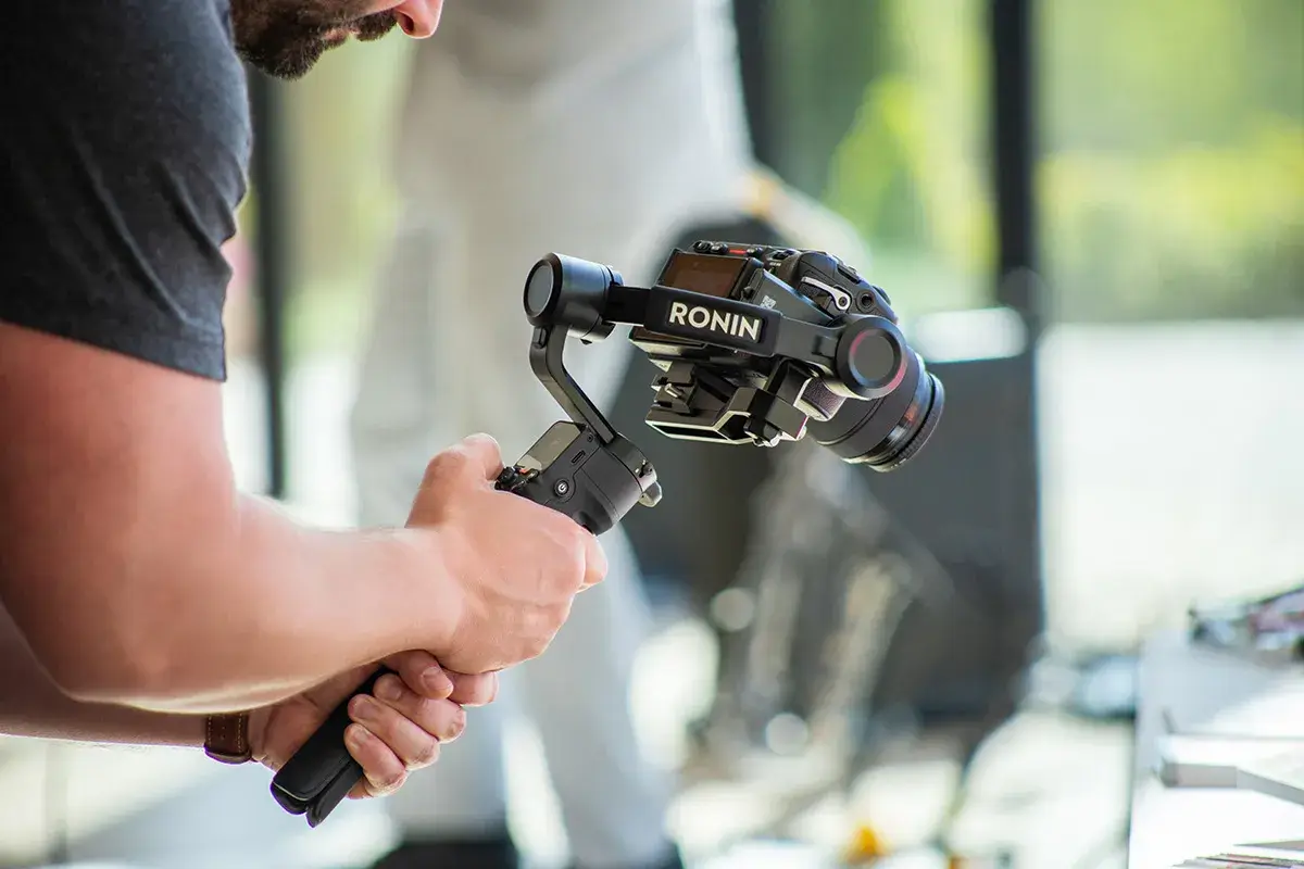 The videographer near me recording at an event 