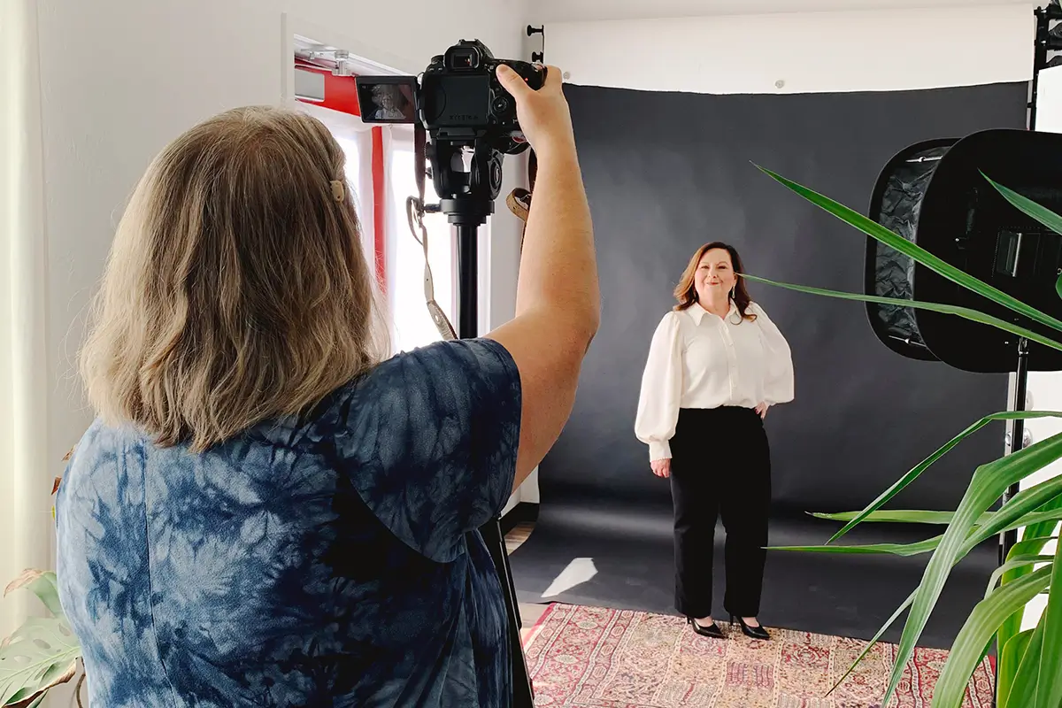 A photographer taking a headshot