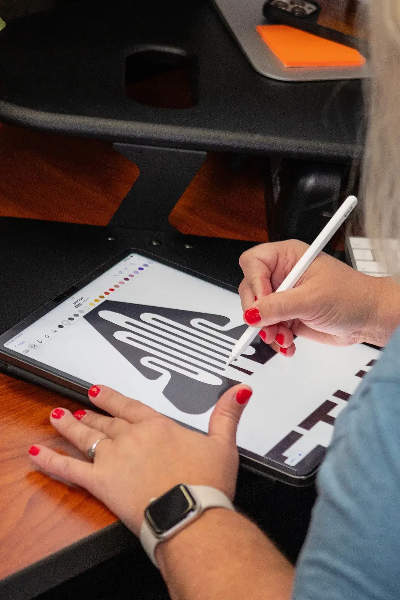 craftsmanship-with-strategy A designer sketching a custom logo