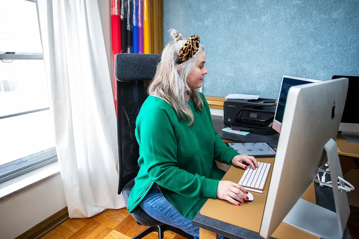 Creative director Amy preparing content