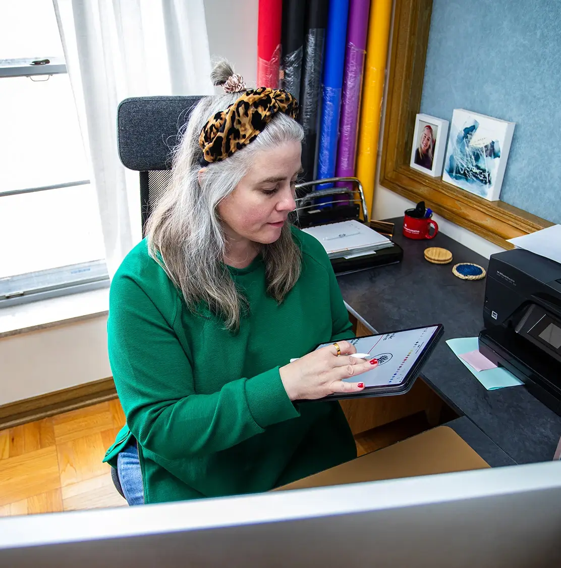 Designer Amy revising logo design