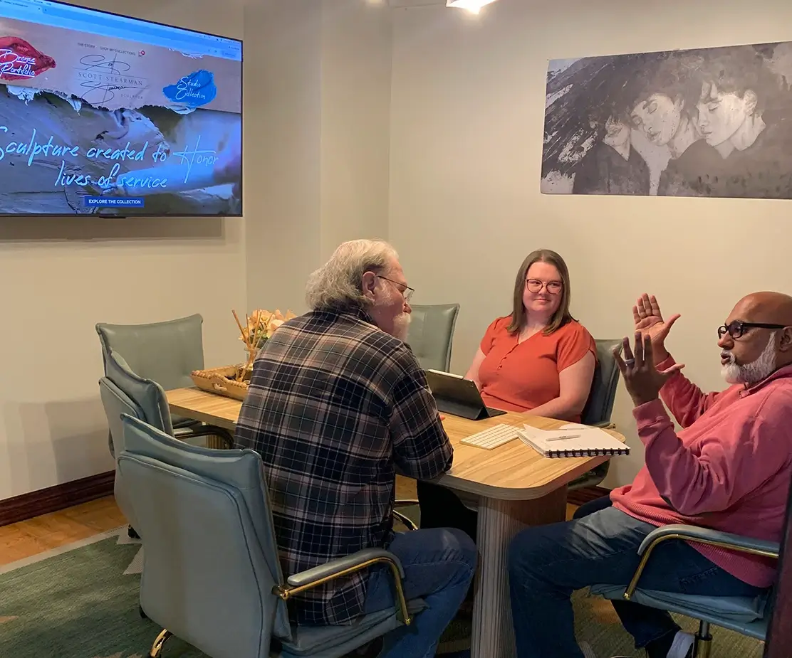 myheartcreative team discussing WordPress website with client