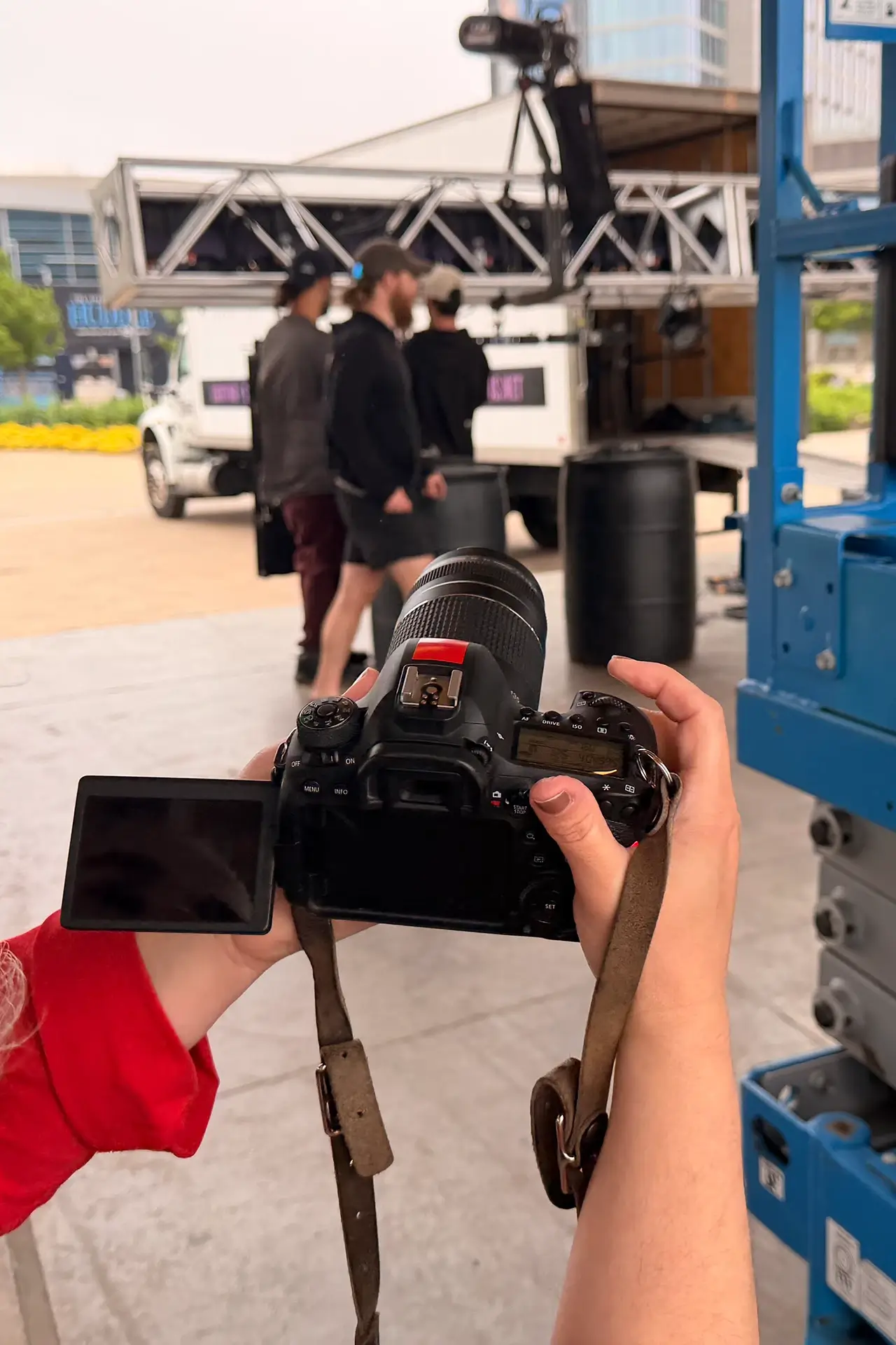 Creative Director with camera at client event