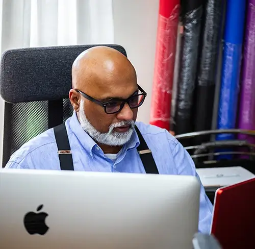 Why Focus on Web Accessibility Operations director reviewing information on computer